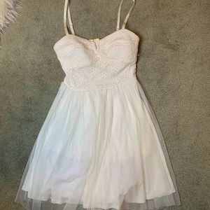 A white cute dress could be a prom or party dress